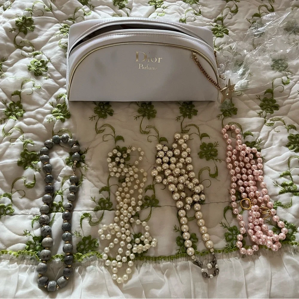 Dior cosmetic bag & some fun beaded jewelry. Great size for travel.